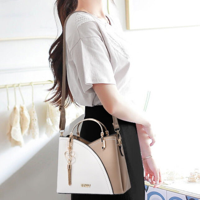Bolso de Mano con Acabado Elegante y Correa Ajustable