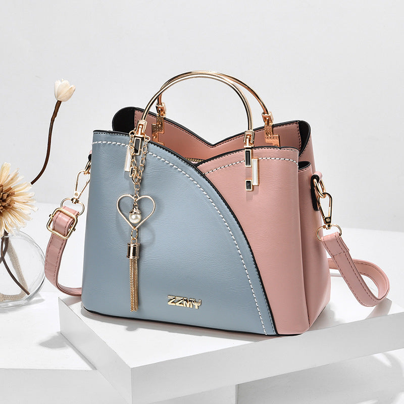 Bolso de Mano con Acabado Elegante y Correa Ajustable