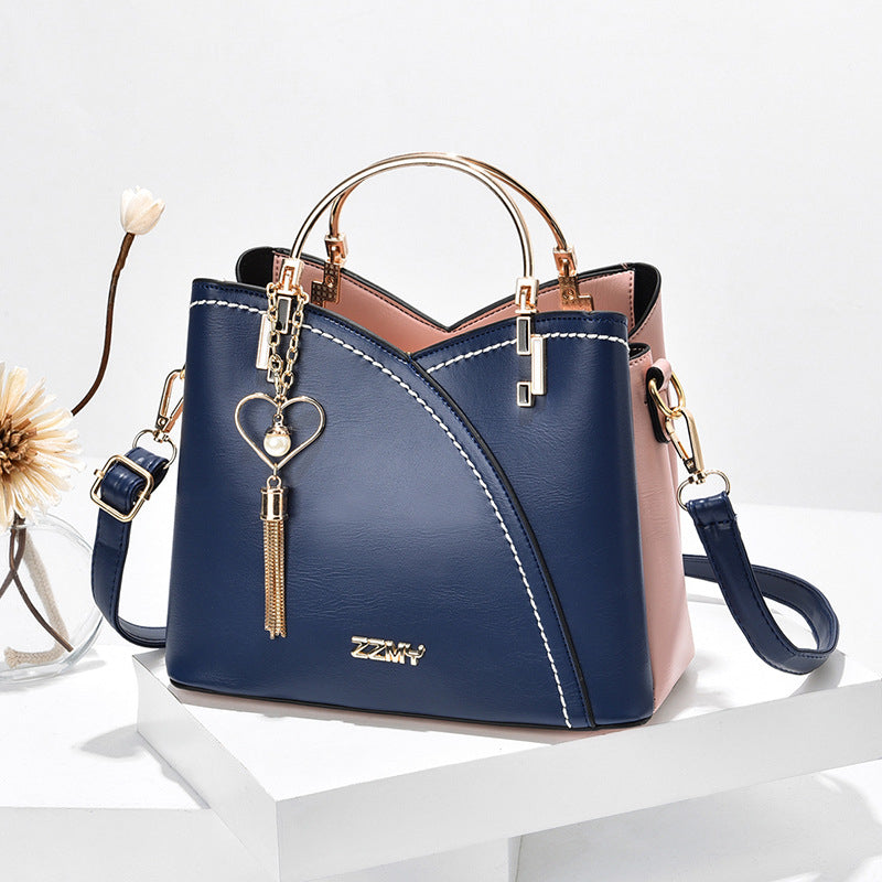 Bolso de Mano con Acabado Elegante y Correa Ajustable