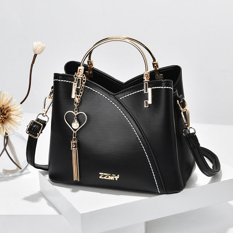 Bolso de Mano con Acabado Elegante y Correa Ajustable