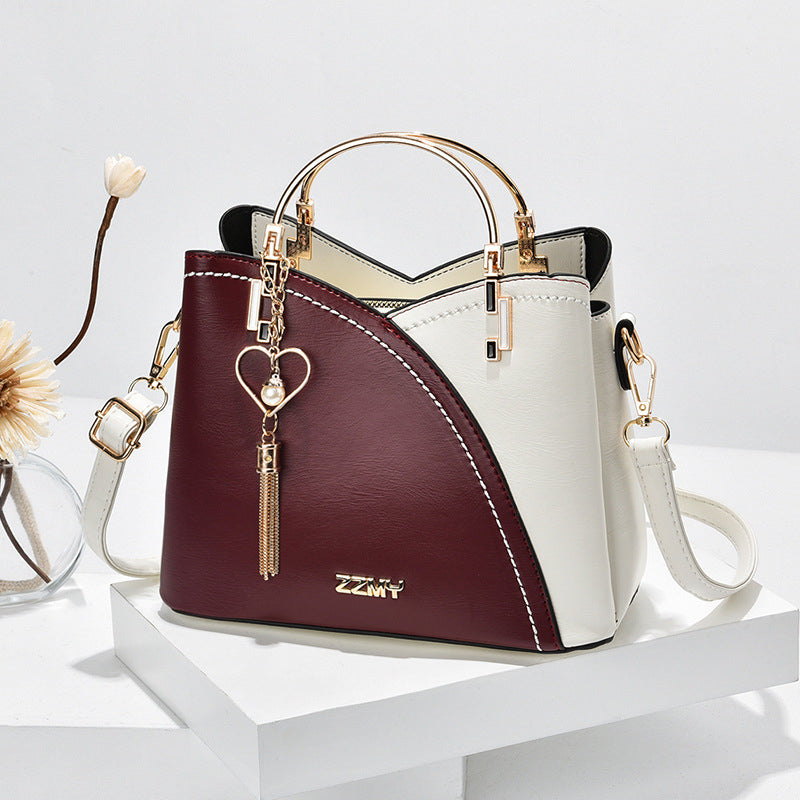 Bolso de Mano con Acabado Elegante y Correa Ajustable